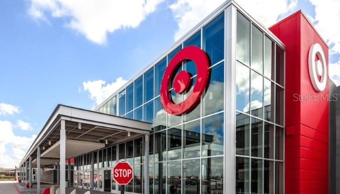 Exterior view of a modern Target store building with a glass facade and red signage — 6905 PEARSON LANE, WESLEY CHAPEL, FL