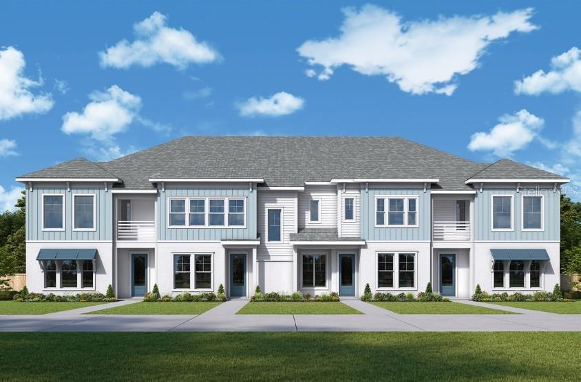 A digital rendering of a two-story multi-family residential building with blue and white siding — 7207 TIDELAND LANE, SARASOTA, FL