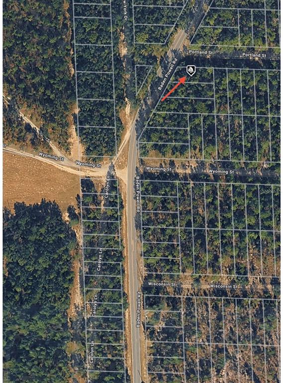 This aerial map shows a vacant lot marked with an arrow along Baden Powell Road — BADEN POWELL ROAD, HAWTHORNE, FL