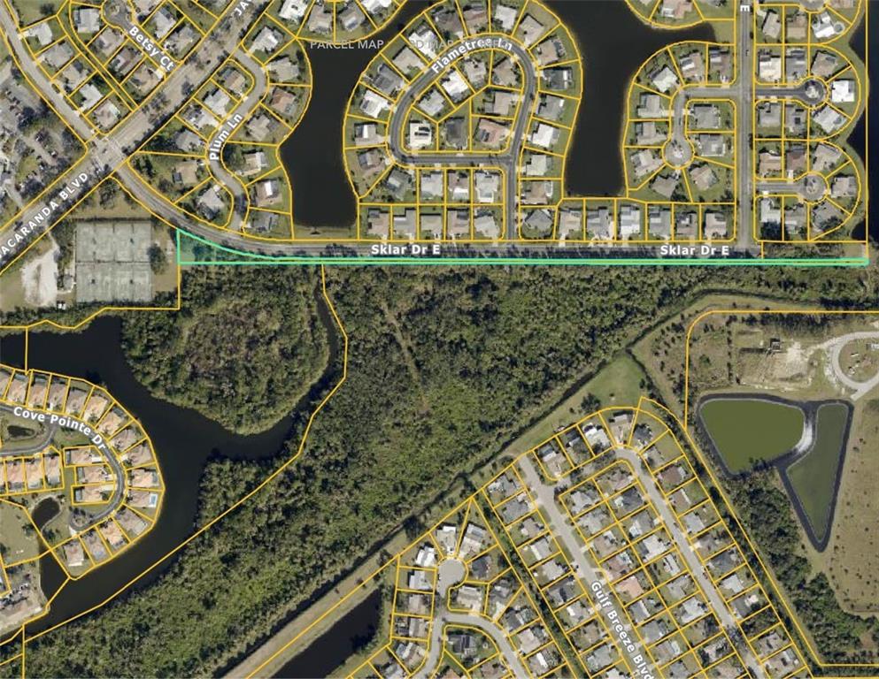 An aerial map view shows a residential neighborhood with a highlighted parcel of land — E SKLAR DRIVE, VENICE, FL
