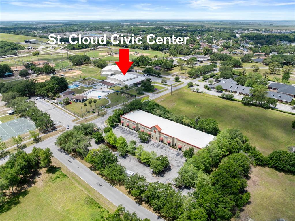 An aerial view shows the St. Cloud Civic Center and a nearby commercial building — 3002 17TH STREET, ST CLOUD, FL