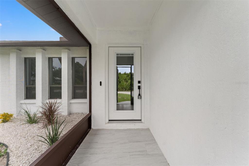 7422 BANBURY TERRACE, PORT CHARLOTTE, FL — photo 2 of 24