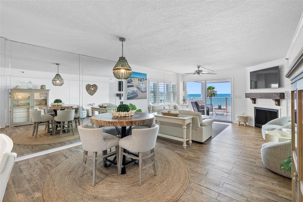 A view of a sandy beach and the ocean from an elevated outdoor balcony — 17980 GULF BOULEVARD UNIT 401, REDINGTON SHORES, FL