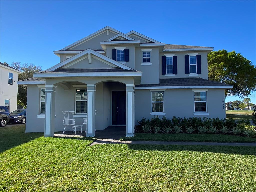 17740 SAWGRASS RUN, TAVARES, FL — photo 2 of 28