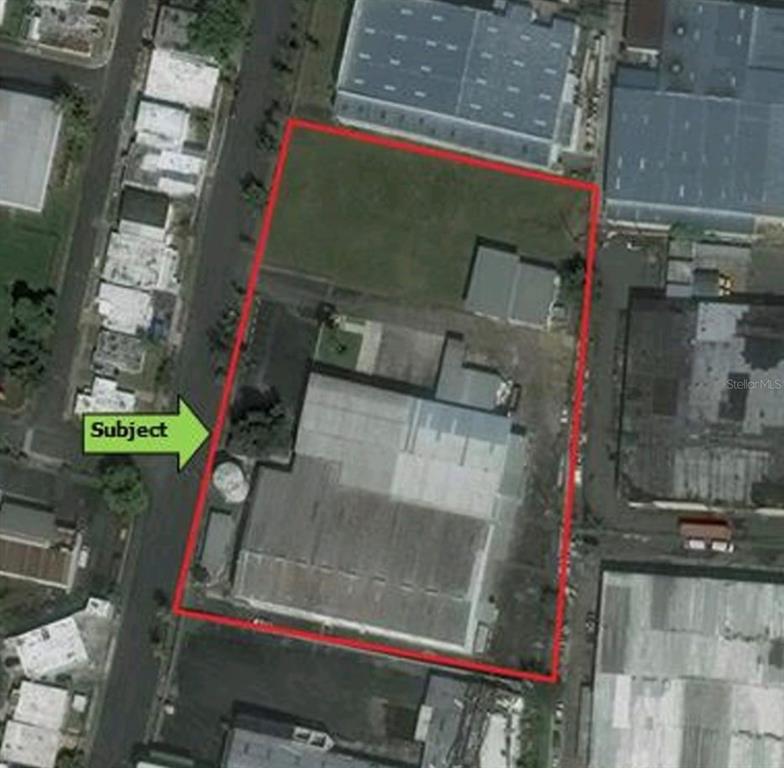 An aerial view shows a rectangular industrial property outlined in red with a large warehouse — Warehouse JARDINES CAROLINA, ROSENDO VELA ACOSTA ST. UNIT 6A & 6B, CAROLINA, PR