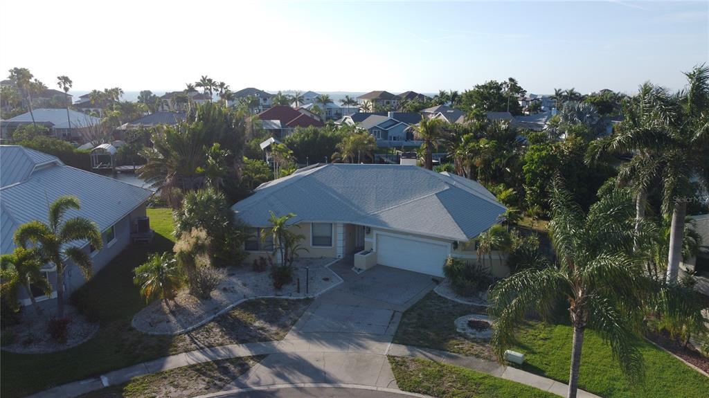An aerial view of a single-story house with a gray roof and a two-car garage — 6612 BLACKFIN WAY, APOLLO BEACH, FL