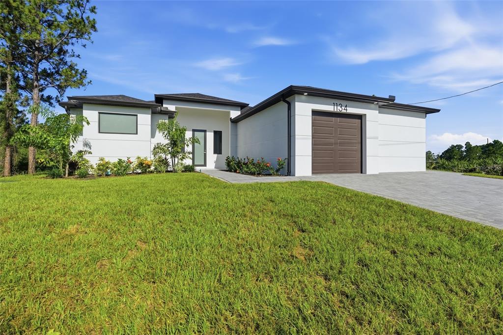 1134 HOLMES AVE S, LEHIGH ACRES, FL — photo 2 of 30