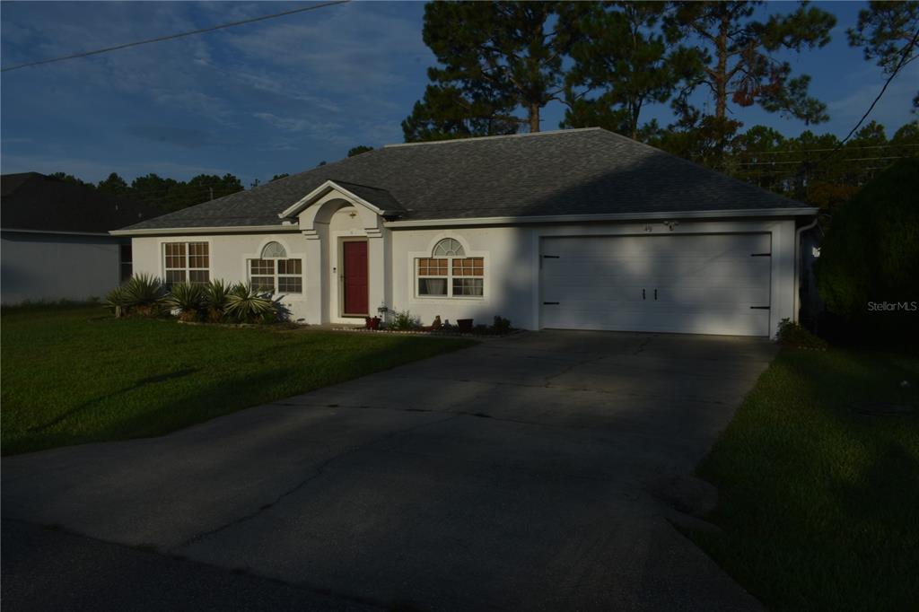 49 BUFFALO GROVE DRIVE, PALM COAST, FL — photo 2 of 28