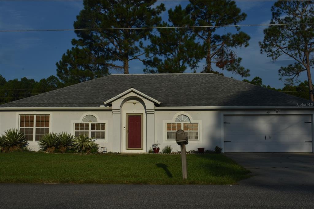 49 BUFFALO GROVE DRIVE, PALM COAST, FL — photo 3 of 28