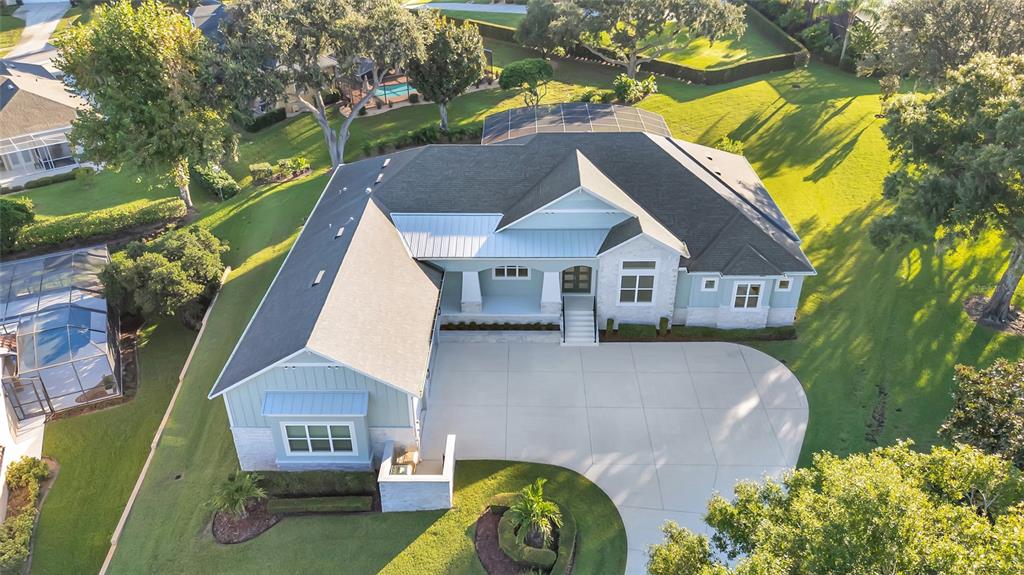 11906 HERON COVE, CLERMONT, FL — photo 2 of 58