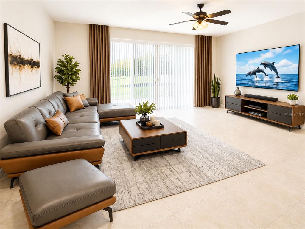 A modern living room features a grey leather sectional, wooden coffee table, and large television — 7605 ALOMA PINES COURT, WINTER PARK, FL