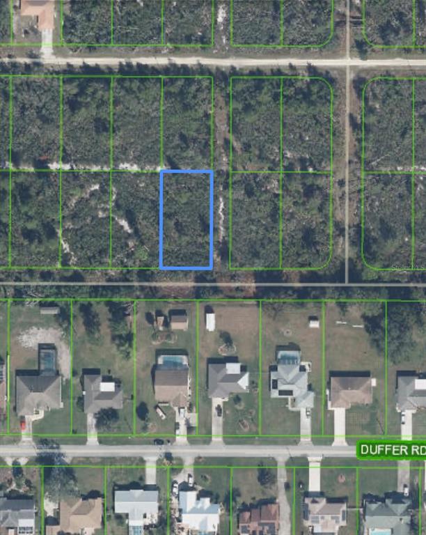 This aerial map shows a vacant rectangular lot highlighted in blue above a residential street — 508 SANDERLING AVENUE, SEBRING, FL