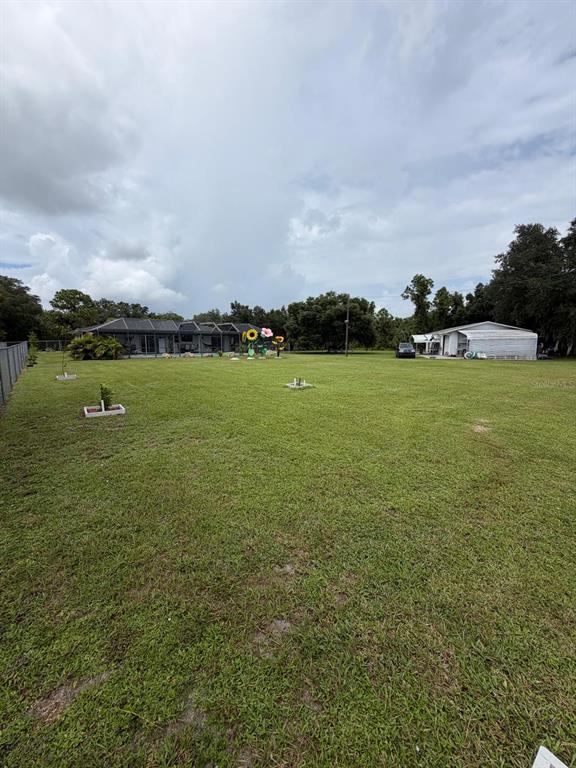 704 CLEVELAND AVE, LEHIGH ACRES, FL — photo 2 of 30