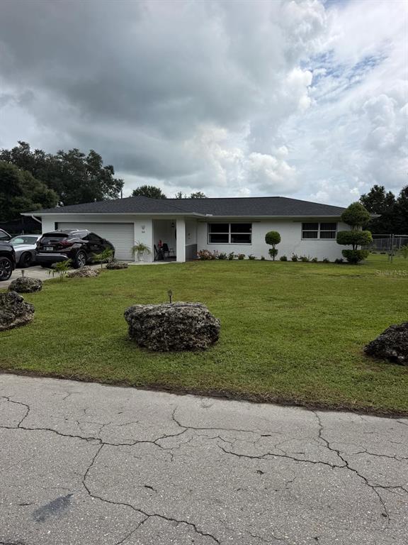704 CLEVELAND AVE, LEHIGH ACRES, FL — photo 5 of 30
