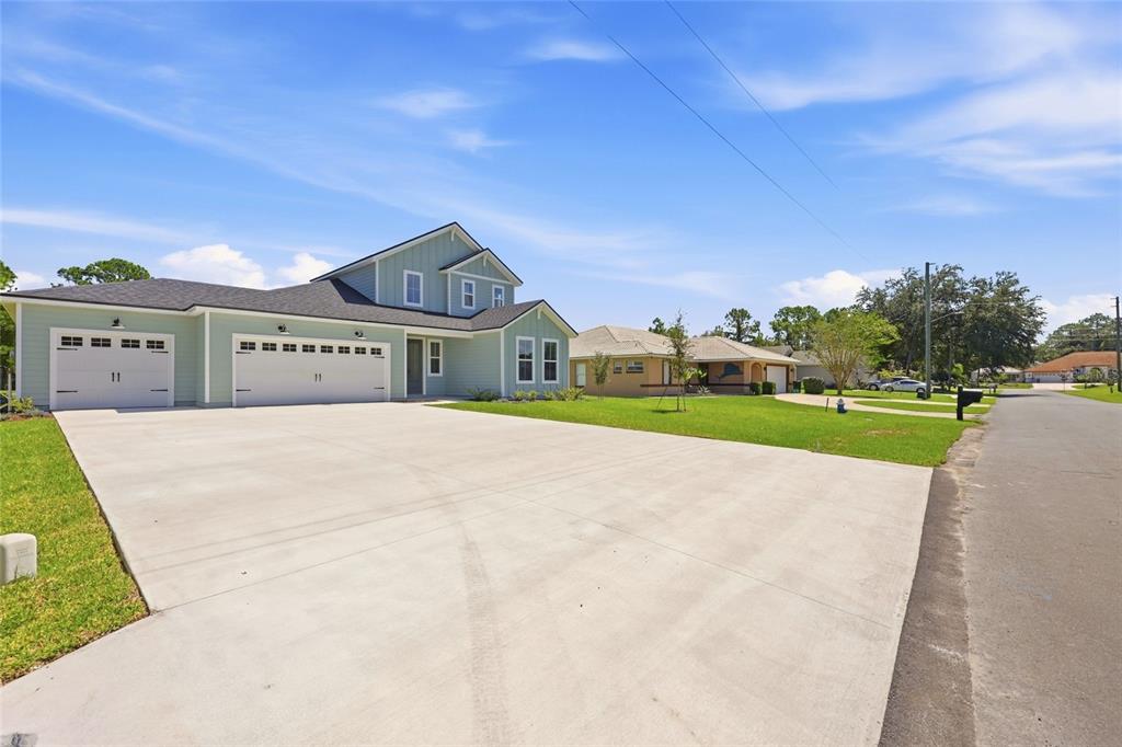 55 WOODHOLLOW LANE, PALM COAST, FL — photo 2 of 30