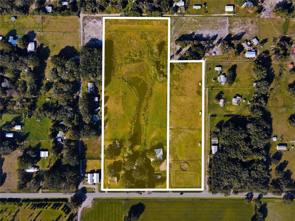 An aerial view shows two adjacent rectangular parcels of land featuring grass, trees, and ponds — 8719 & 8809 LITHIA PINECREST ROAD, LITHIA, FL