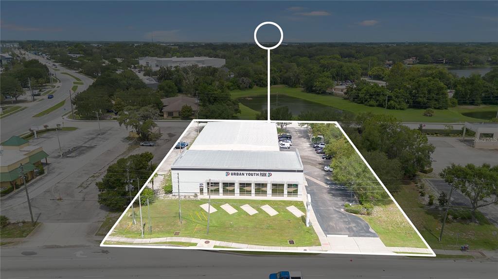 An aerial view shows a commercial building labeled Urban Youth Park with an adjacent parking lot — 2350 S US HIGHWAY 17 92, LONGWOOD, FL