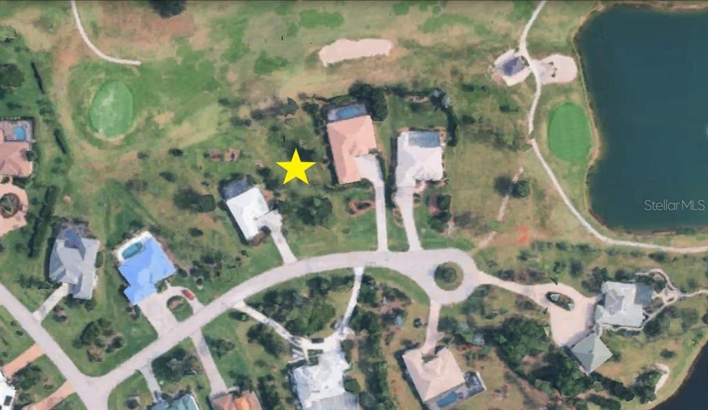 This is an aerial map view of a residential neighborhood with houses and a golf course — 3030 BIG BEND CIRCLE, PUNTA GORDA, FL