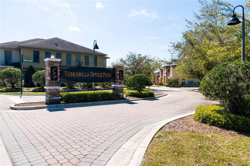 The entrance to Tuskawilla Office Park features a brick monument sign and paved driveway — 1100 TOWN PLAZA COURT UNIT 2010-F, WINTER SPRINGS, FL