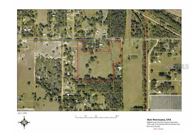 This is an aerial map showing a parcel of land outlined in red — DURANT RD, DOVER, FL