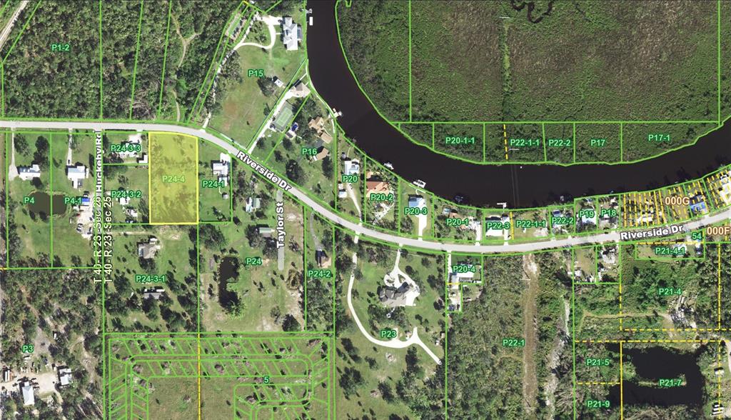 This is an aerial map showing property parcel boundaries and road layouts — 7215 RIVERSIDE  DR., PUNTA GORDA, FL