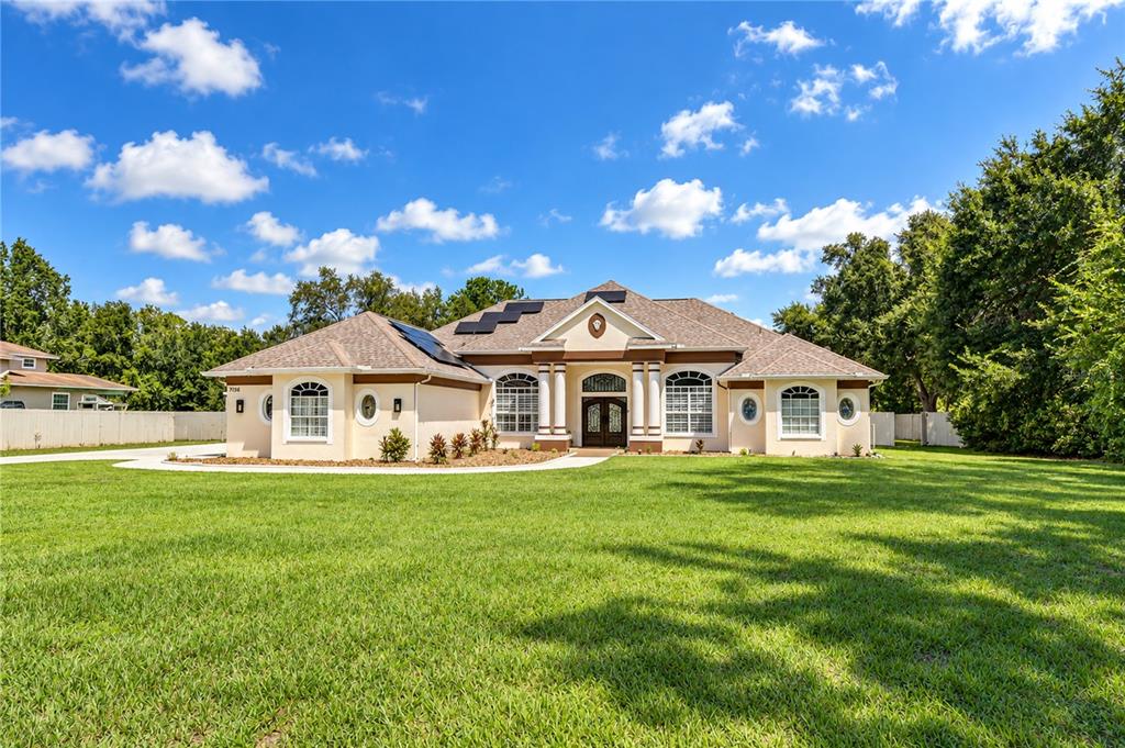 7136 QUAIL HOLLOW BOULEVARD, WESLEY CHAPEL, FL — photo 4 of 30