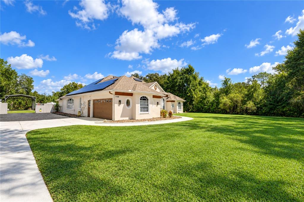 7136 QUAIL HOLLOW BOULEVARD, WESLEY CHAPEL, FL — photo 5 of 30