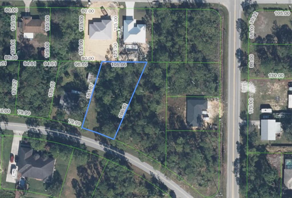 This is an aerial map showing a highlighted vacant residential lot with surrounding properties — 1714 STREAM AVENUE, SEBRING, FL
