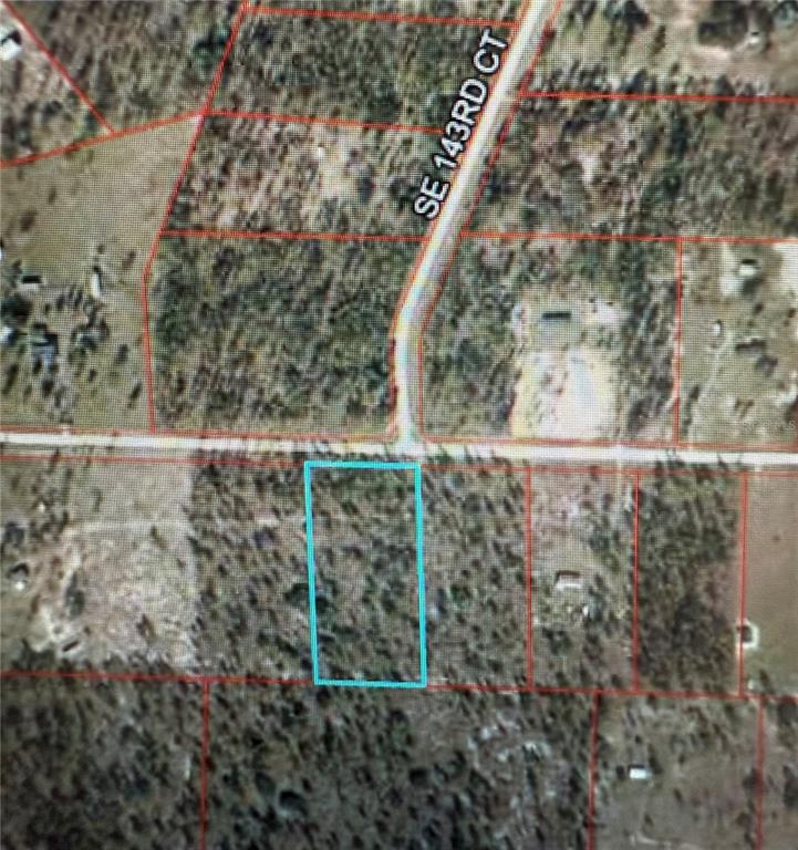 An aerial map view shows a rectangular parcel of land outlined in light blue — 00 SE 73RD LANE, MORRISTON, FL