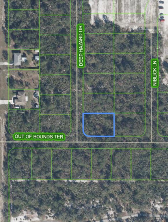This is a map showing a vacant residential lot highlighted in blue within a neighborhood — 10662 DEEP HAZARD DRIVE, SEBRING, FL
