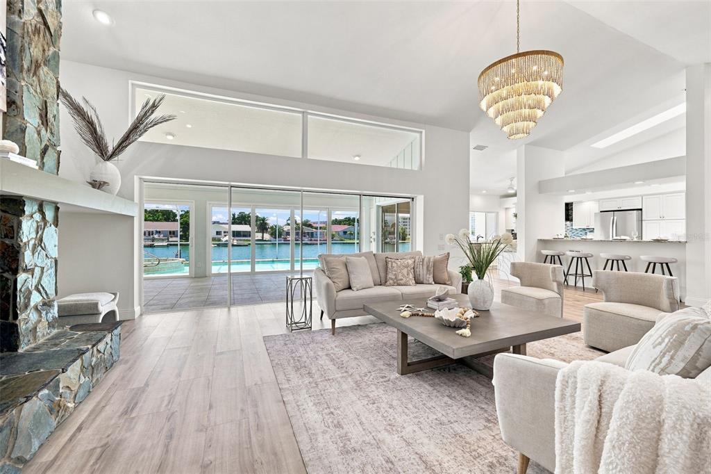 An aerial view of a single-story house with a gray roof and a concrete driveway — 5921 SEABIRD DRIVE S, GULFPORT, FL