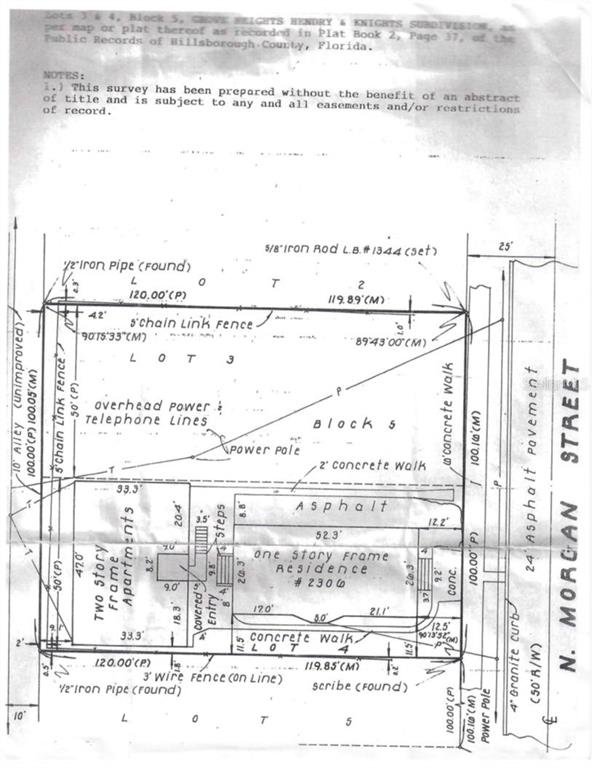 This is a property survey map showing two buildings, a fence, and surrounding street boundaries — 2306 N MORGAN STREET, TAMPA, FL
