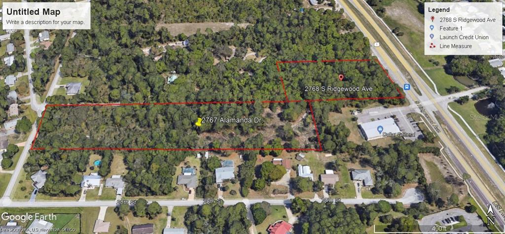 This is an aerial map showing two adjacent wooded lots outlined in red — 2768 S RIDGEWOOD AVENUE, EDGEWATER, FL