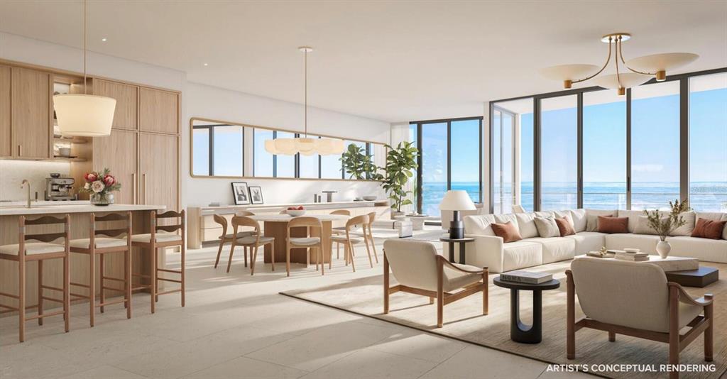 This artist's conceptual rendering shows an open-concept living area with light wood cabinetry and ocean views — 197 AVENUE DE LA MER UNIT 401, PALM COAST, FL