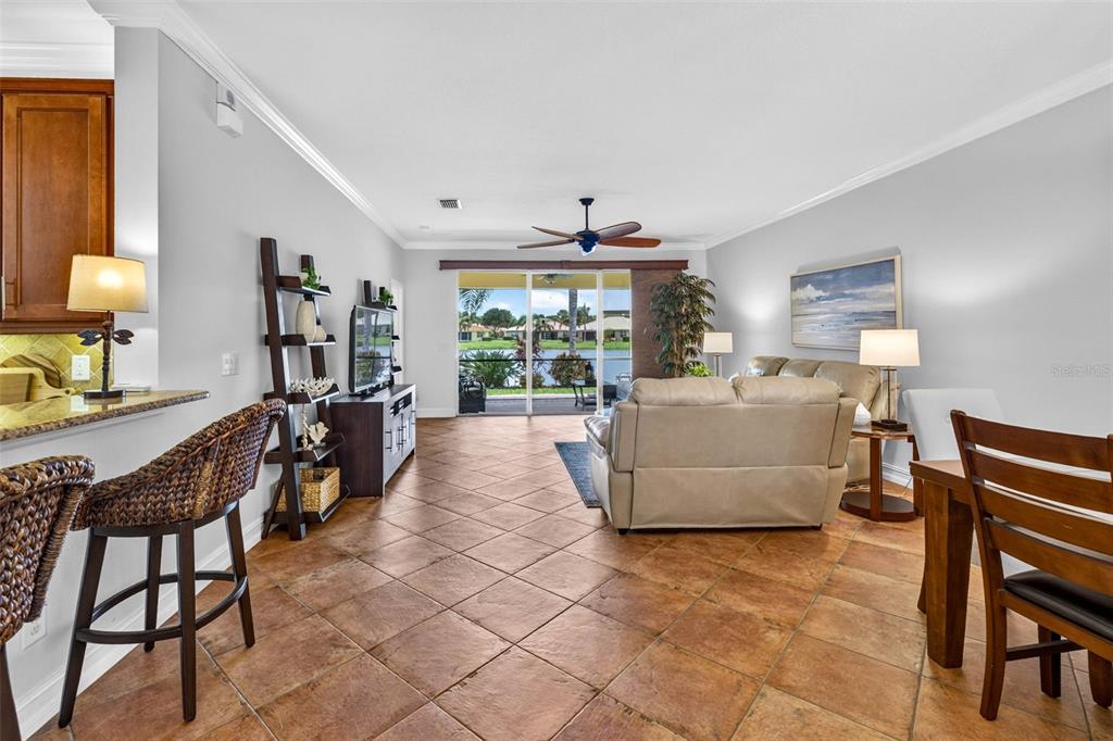 This floor plan rendering shows a two-bedroom villa with a den, two baths, and garage — 16227 AMETHYST KEY DRIVE, WIMAUMA, FL