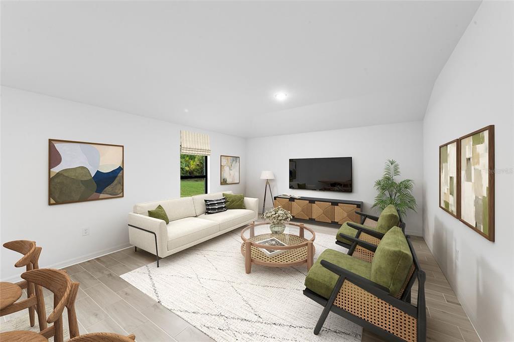 This is a digital rendering of a living room featuring a sofa, chairs, and television — 6572 N EARLSHIRE TERRACE, CITRUS SPRINGS, FL