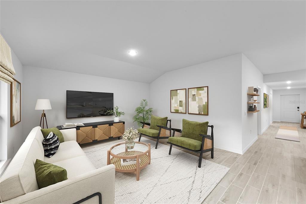 This is a digital rendering of a living room with a sofa, chairs, and television — 6572 N EARLSHIRE TERRACE, CITRUS SPRINGS, FL