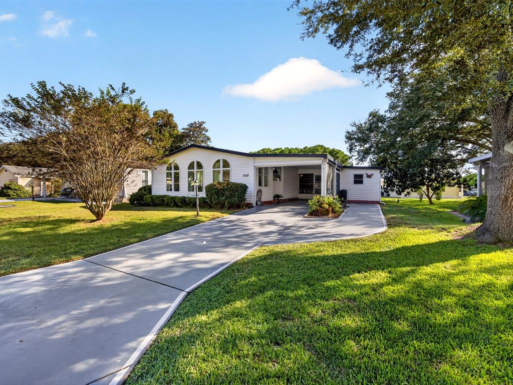 660 RAINBOW BOULEVARD, THE VILLAGES, FL — photo 2 of 26
