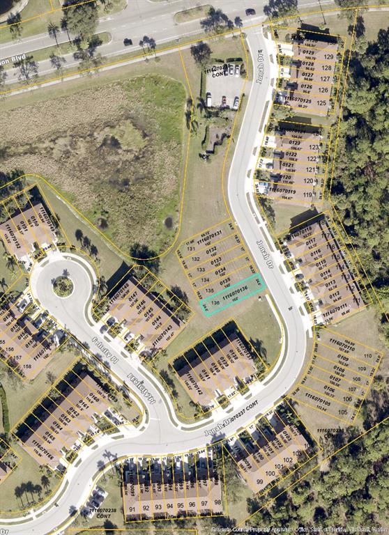 This is an aerial map showing residential property lots and streets — 1300 JONAH DRIVE, NORTH PORT, FL