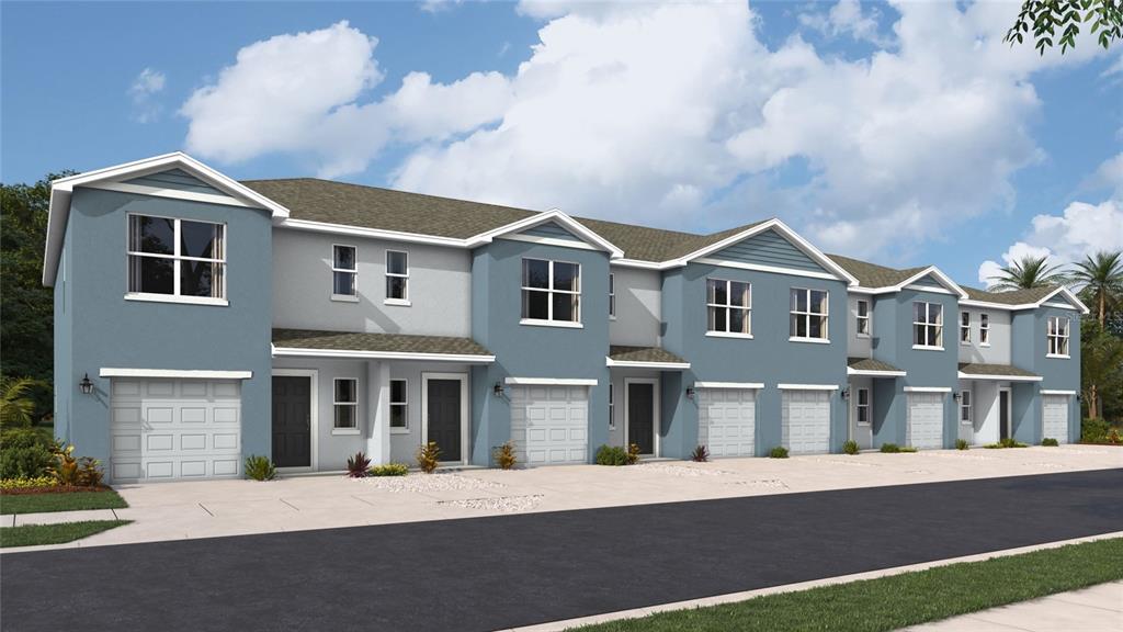 This is a digital rendering of a multi-unit townhouse complex with blue siding and garages — 4023 RED BANKS LANE, BRADENTON, FL