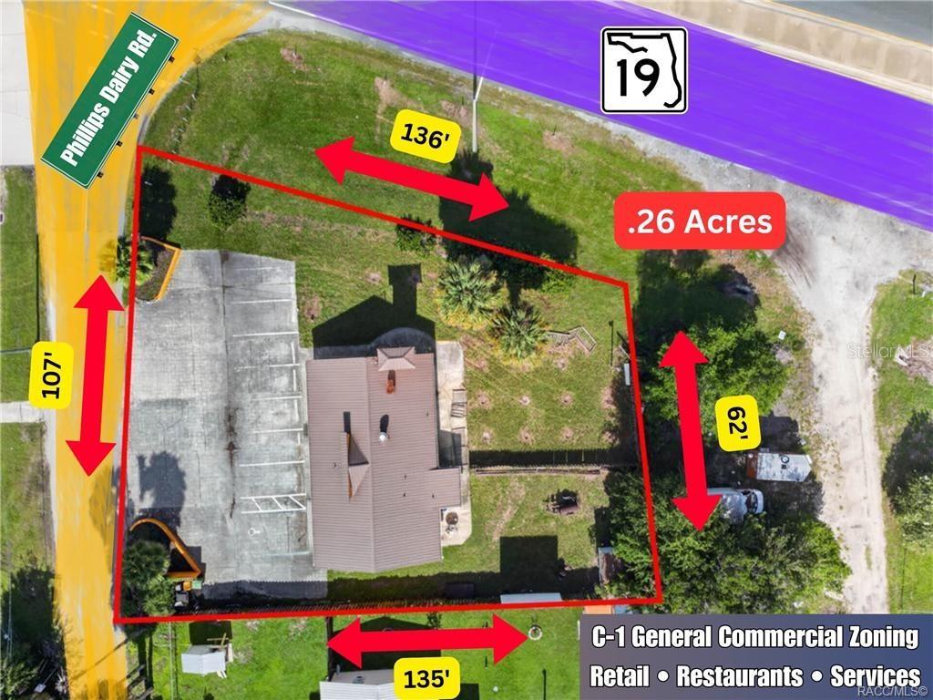 An aerial view shows a commercial lot with a building, parking area, and property dimensions — 102 PHILLIPS DAIRY ROAD, PALATKA, FL