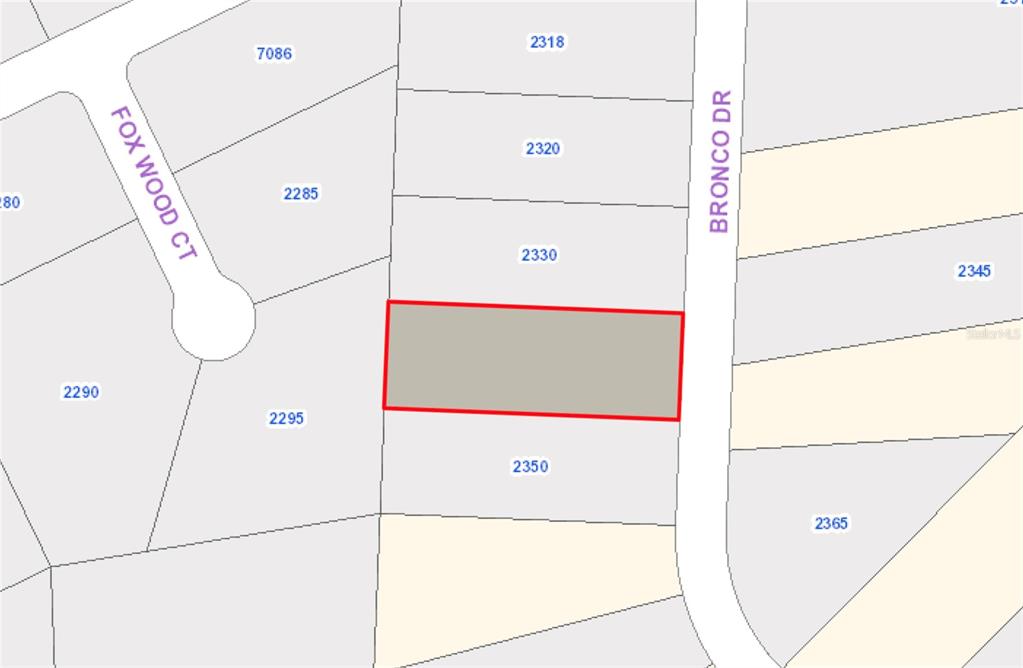 This is a map showing a highlighted rectangular property lot located along a street — 2340 BRONCO DRIVE, ST CLOUD, FL