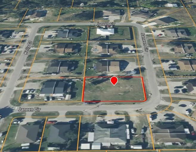 This is an aerial map view of a vacant residential lot outlined in red — JANEEN CIRCLE, MULBERRY, FL