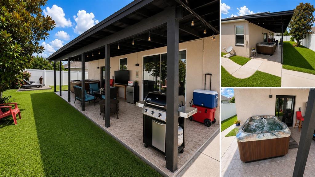 A covered patio features a grill, hot tub, and outdoor seating area overlooking a grassy yard — 8703 FORT SHEA AVENUE, ORLANDO, FL