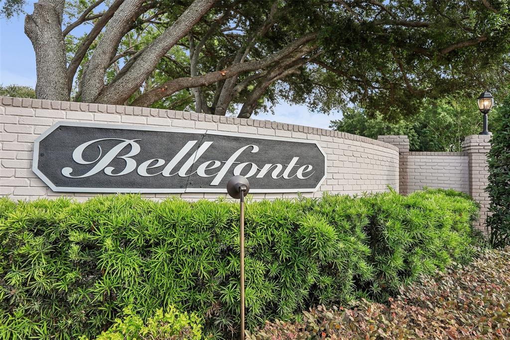 A brick wall features a sign reading Bellefonte in front of trees and landscaping — 1012 MORFIELD LANE, BRANDON, FL