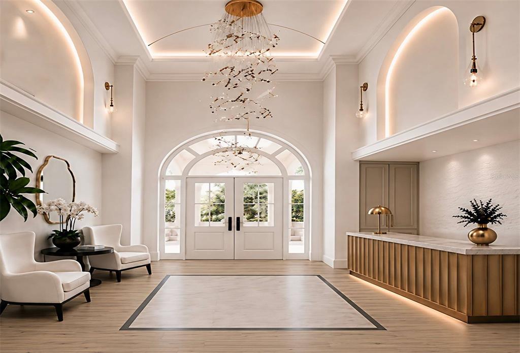 This is a rendering of a bright, modern lobby with a reception desk and chandelier — 464 GOLDEN GATE POINT UNIT 702, SARASOTA, FL