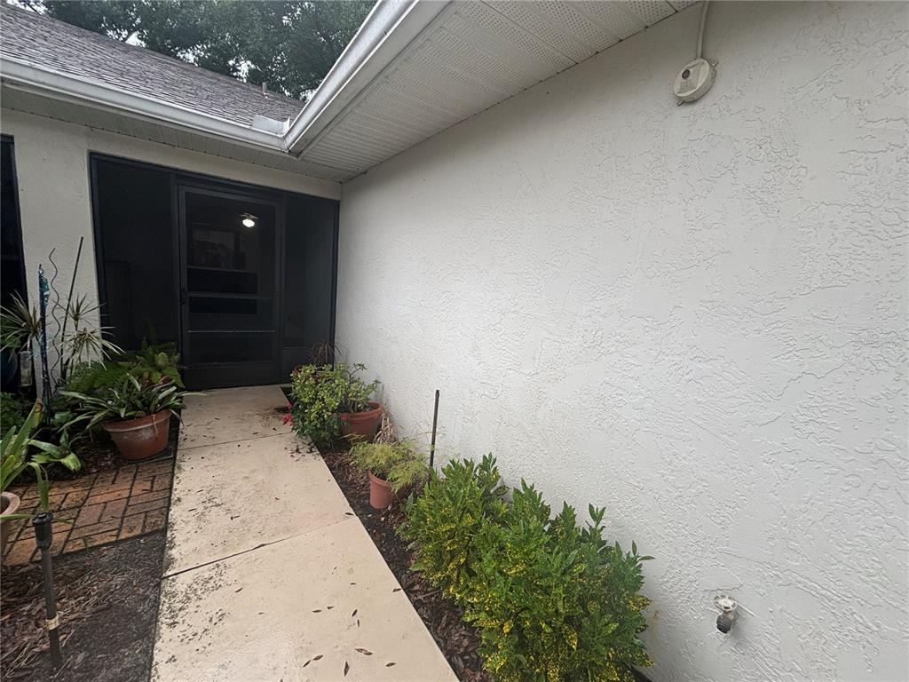 8815 VILLAGE GREEN BOULEVARD, CLERMONT, FL — photo 2 of 25