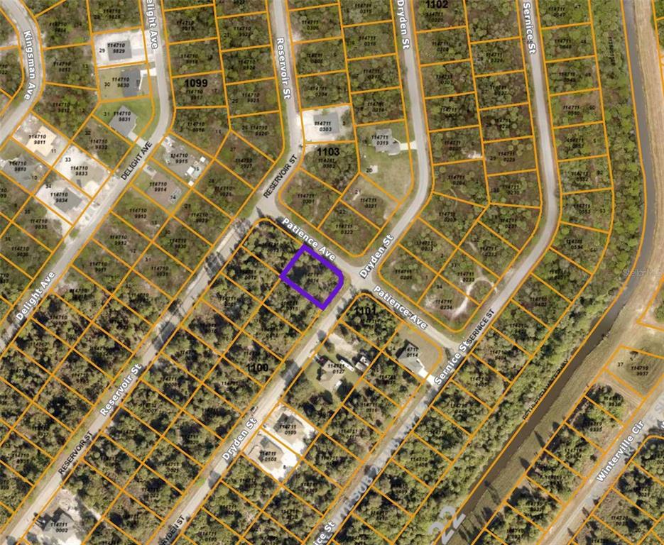 This is an aerial map showing a vacant lot outlined in purple at a street intersection — PATIENCE AVE, NORTH PORT, FL