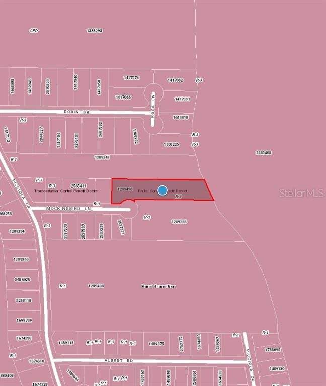 This is a map showing property parcel boundaries and zoning designations in a residential area — MOCKINGBIRD LANE, FRUITLAND PARK, FL