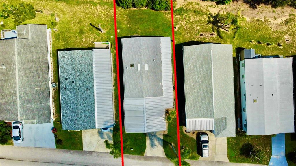 An aerial view shows three adjacent houses with driveways and roofs, marked by red lines — 50989 HIGHWAY 27 UNIT 182, DAVENPORT, FL